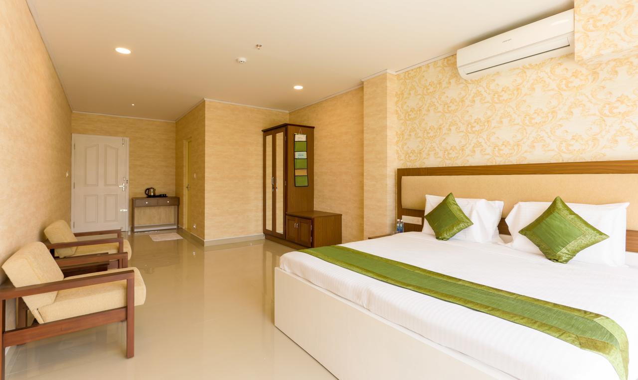 Hotel Heaven Gardens Kochi Esterno foto
